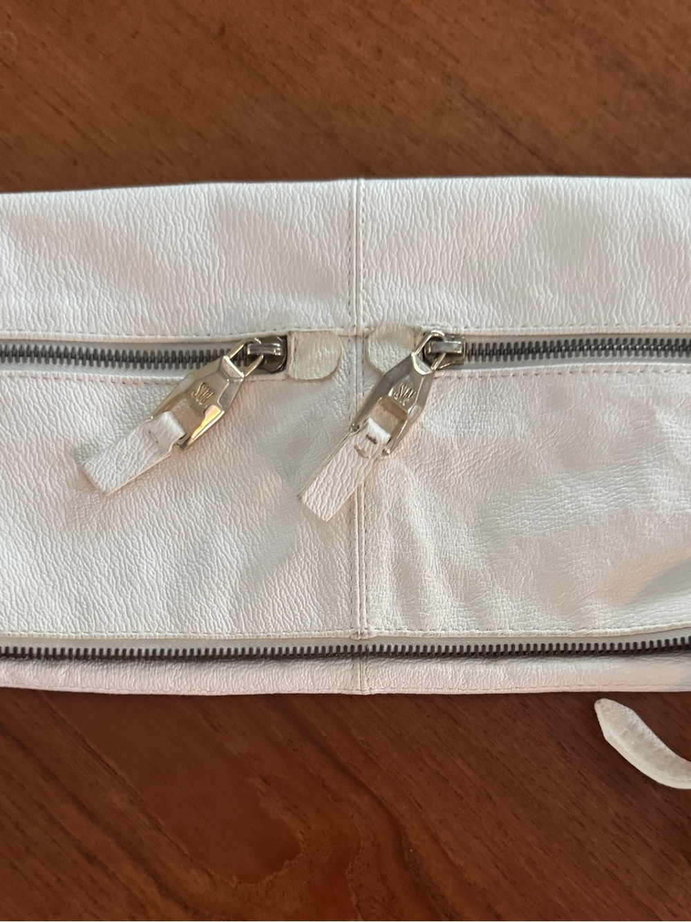 Stuart Weitzman white pebbled leather fold-over double zip clutch bag